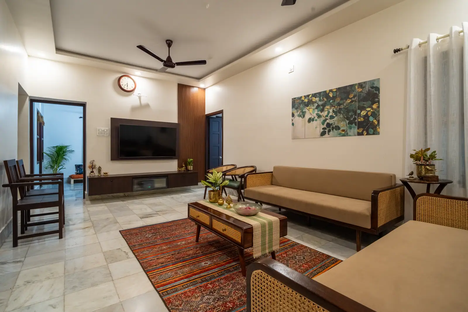 Unwind in our spacious living area, where heritage charm meets contemporary comfort for a relaxing stay.
